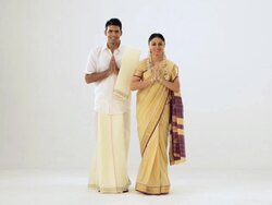 Portrait of a south Indian couples welcoming Stock Footage