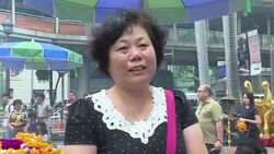 VOICED : Chinese still flock to lucky Bangkok shrine hit by blast News Clip