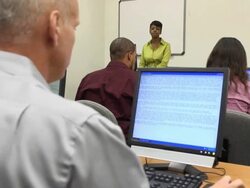 Caucasian Female Teaching Adult Students - MS Stock Footage