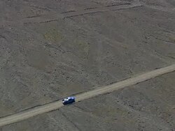 WS AREAIL View of One van moving in between Thorsmork valley / Iceland Stock Footage