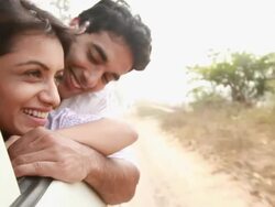 Couple watching from window of a car  Stock Footage