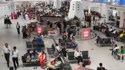 Airport departure lounges and cafes at the Delhi Airport Stock Footage