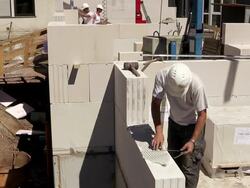 MS Shot of workmen working measurement at house construction / Hermeskeil, Rhineland-Palatinate, Germany Stock Footage