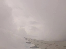Commercial Flight Navigating Around Thunderstorms Stock Footage