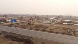 Aerial View of Oil Field, Oil Tank Truck and Air Pollution In China Stock Footage