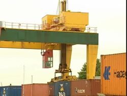 Crane lifting P&O container, Container Terminal, Southampton, UK Stock Footage