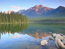 Mountain reflection in lake Stock Footage