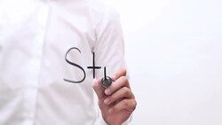 Hand Writing 'Strategy' Stock Footage