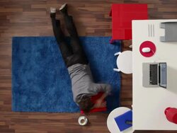 T/L, MS, Lockdown, restless businessman in his home office, overhead view Stock Footage