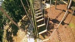 Walking at the zip line adventures Stock Footage