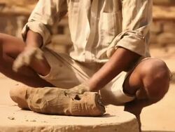Potter kneading clay, Faridabad, Haryana, India Stock Footage