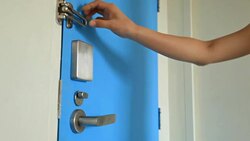 HD Dolly:Hand using lock door. Stock Footage