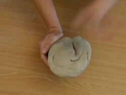 CU Shot of female potter kneads clay at pottery / Landshut, Bavaria, Germany Stock Footage