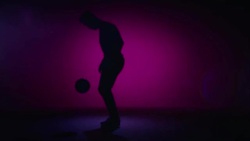 young male soccer freestyler is kicking up a ball Stock Footage