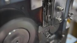 close-up: using grinder to cut plastic extrude to form plastic pellet Stock Footage