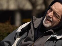 Man Drinks in Urban Setting - CU Stock Footage