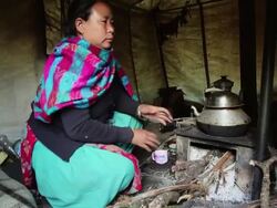 MS Woman preparing her lunch / Durma, Banke District, Nepal Stock Footage