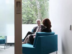 MS PAN businessman and businesswoman in discussion in office/Seattle, Washington, USA Stock Footage