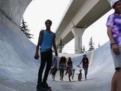 Teenagers at skateboard park Stock Footage