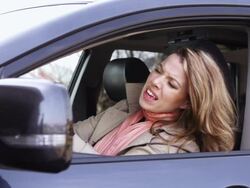 Angry young woman in the car Stock Footage