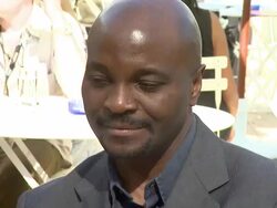 Emile Abossolo M'bo at the L'Homme Qui Crie (Screaming Man) Interviews: Cannes Film Festival 2010 at Cannes . (Footage by WireImage Video/GettyImages) Stock Footage