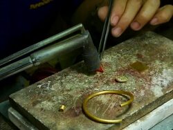 HD:Goldsmith working with a unfinished work. Stock Footage