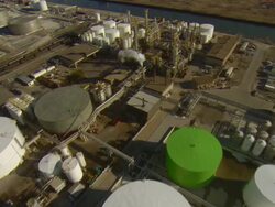 Aerial -Late afternoon oblique shot passing over Safety Clean Systems' chemical processing facility in East Chicago, IN. Stock Footage