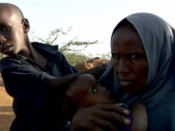 Refugee woman with children Stock Footage