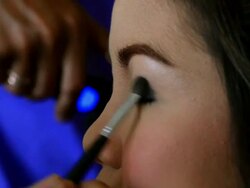 Makeup Artist Applying Make-up on Woman Eye Stock Footage
