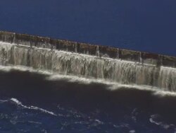 WS ARIEAL View of Water flowing into Veazie Dam / Maine, United States Stock Footage