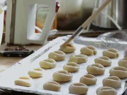  MS TU Cookie dough on tray in kitchen / Lamy, New Mexico, USA Stock Footage