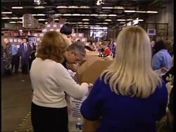 Bush helps with packages for overseas troops News Clip
