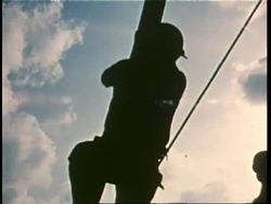 Oil workers work on an offshore oil rig. News Clip