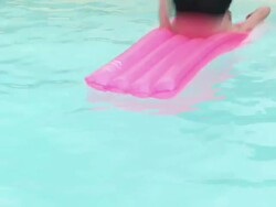 jumping into a swimming pool deep end loop Stock Footage