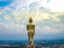 Buddha water reflection with sun flare Stock Footage