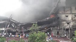 CLEAN : At least 25 dead in Bangladesh factory fire (2) News Clip