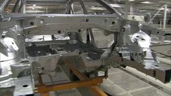 Automated machines operate in an automotive factory. Stock Footage