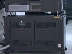MS PAN row of 4K sony digital cinema projectors in large projection booth installation  of modern cinema multiplex Stock Footage