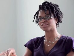 MS coworkers discussing project in office conference room Stock Footage