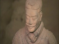 Pan left over Terracotta Warrior faces, Museum of Qin, Xian, China Stock Footage