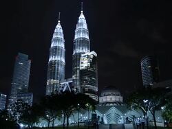 WS View of Petronas Towers at night / Kuala Lumpur, Malaysia Stock Footage