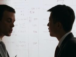 MS Two businessmen discussing in front of white board / China Stock Footage