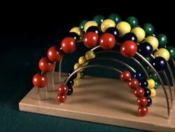 High speed counter for playing cards falling down, color balls bouncing Stock Footage