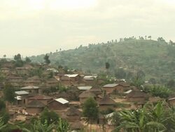 The view of village houses with mountain behind Stock Footage