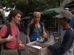 WS ZI CU Young couple buying drinks from street vendor, Bangkok, Thailand Stock Footage