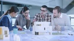 Male architect bringing new design ideas to the meeting table Stock Footage