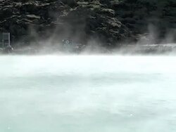 MS Shot of steam rolling off hot spring at resort / Reykjavik, Hofudhborgarsvaedhi, Iceland Stock Footage