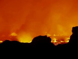 MS Shot of Fiery lava lake bubbles in Nyiragongo volcano crater / Goma, Virunga National Park, Democratic Republic of the Congo Stock Footage
