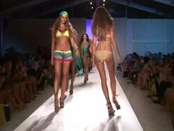 Models walk the runway during the Vitamin A by Amahlia Stevens swimwear 2013 show at the Vitamin A by Amahlia Stevens - Runway - MBFW Miami Swim 2013 Stock Footage