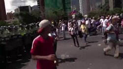 CLEAN : Police block demonstrators on Caracas highway News Clip